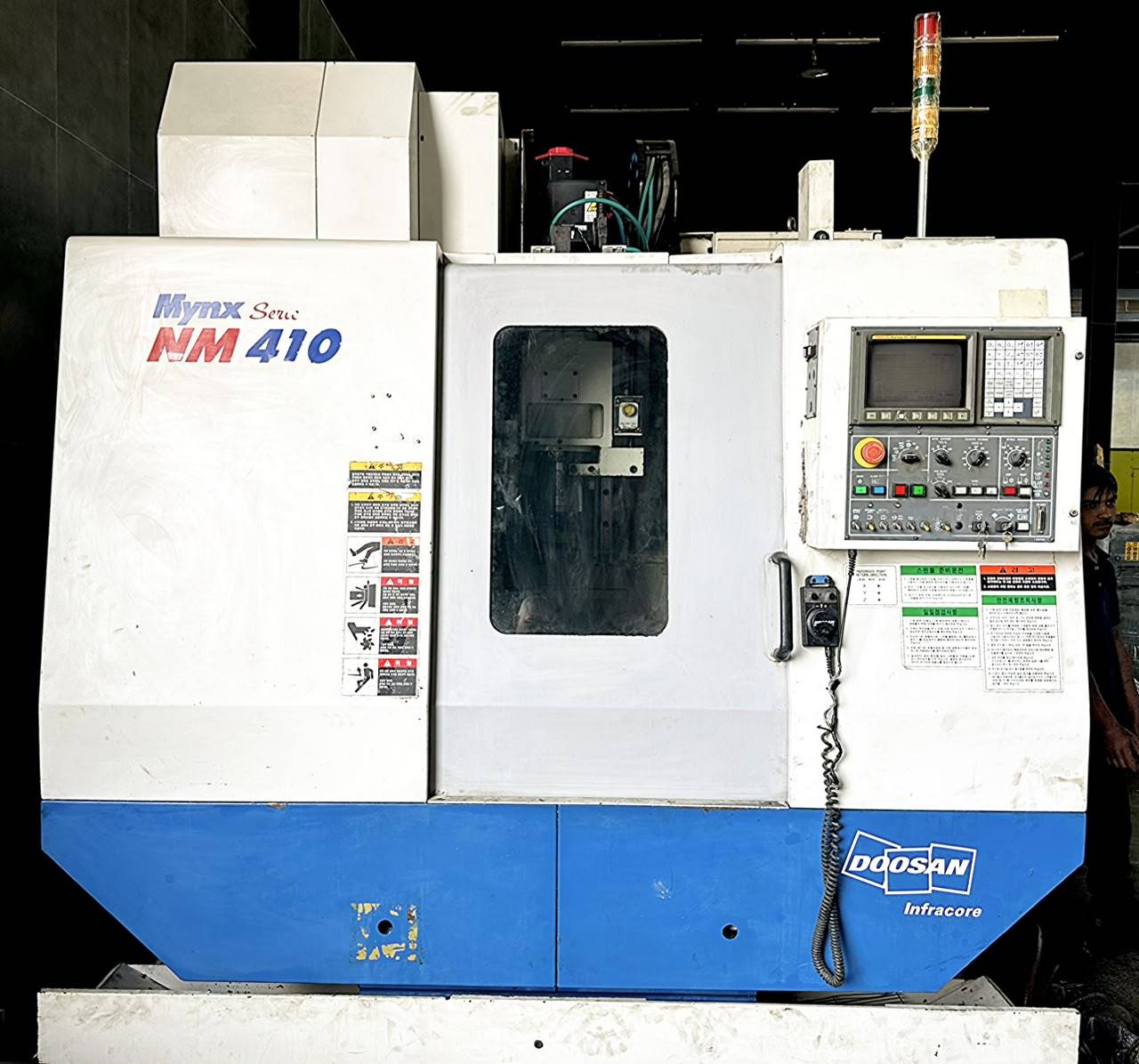 NM410